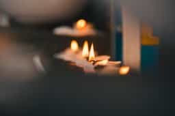 Photo by Thilipen Rave Kumar: https://www.pexels.com/photo/selective-focus-photography-of-lighted-tealights-1686020/