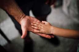 Photo by Juan Pablo Serrano Arenas: https://www.pexels.com/photo/father-and-child-s-hands-together-1250452/