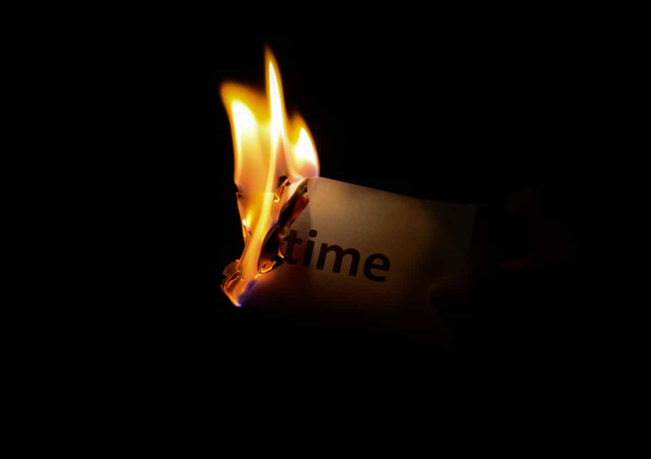 Photo by Eugene Shelestov: https://www.pexels.com/photo/person-holding-burning-paper-in-dark-room-33930/