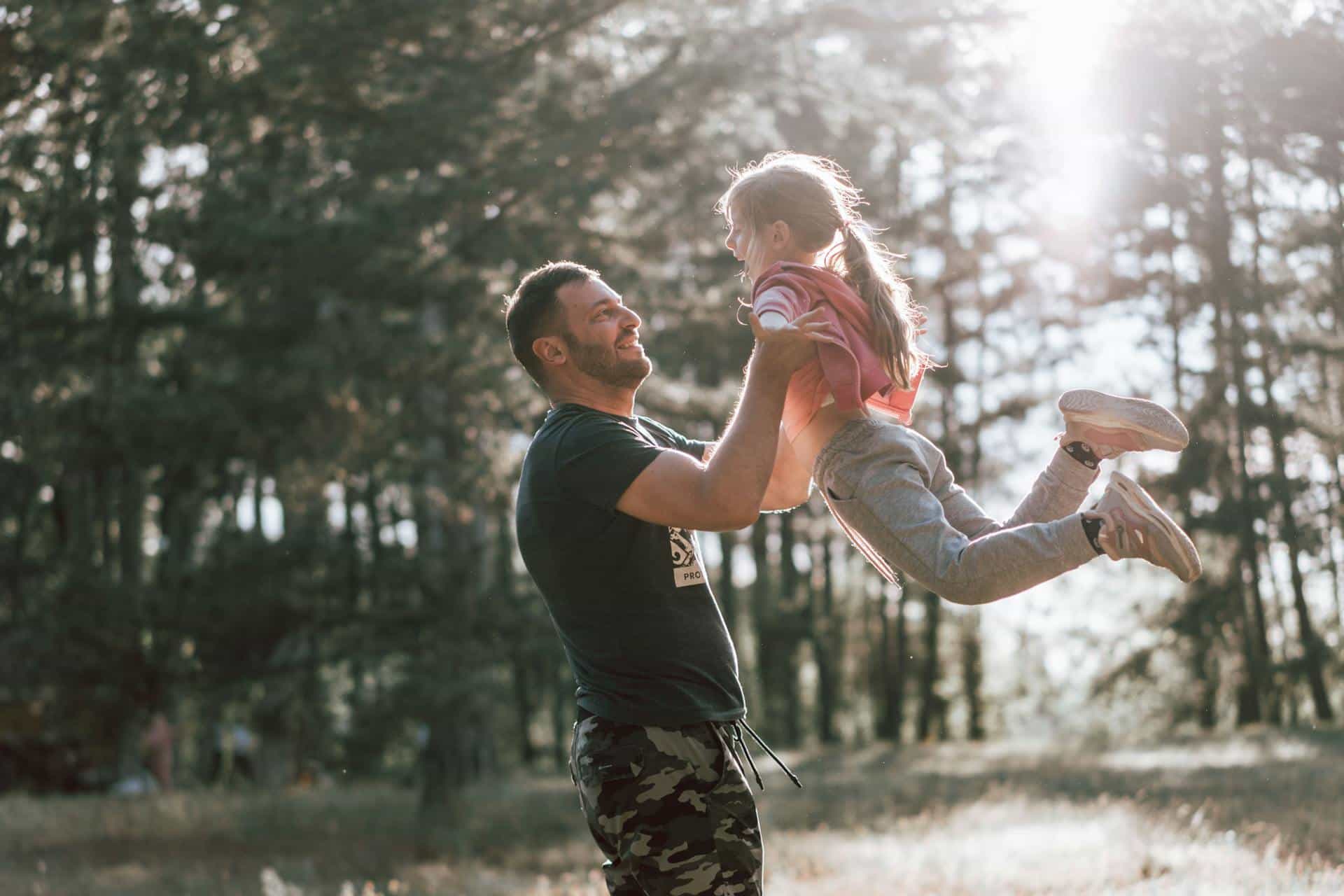 Photo by Oleksandr P: https://www.pexels.com/photo/a-man-in-black-shirt-carrying-a-girl-9275225/